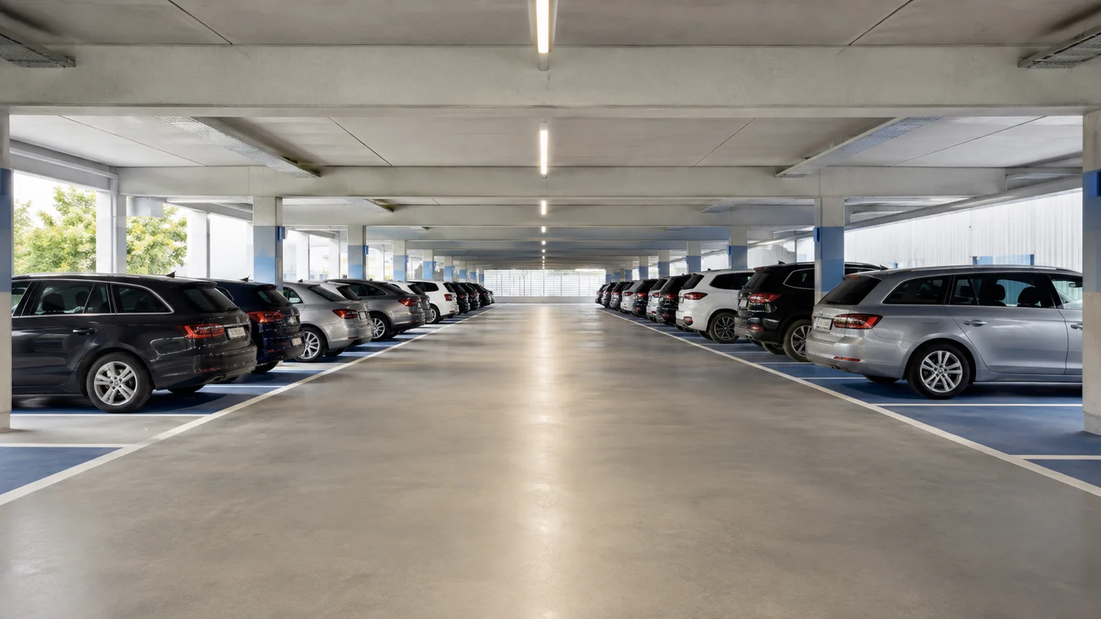 Parking lumineux avec places couvertes et voitures stationnées – illustration générée par IA